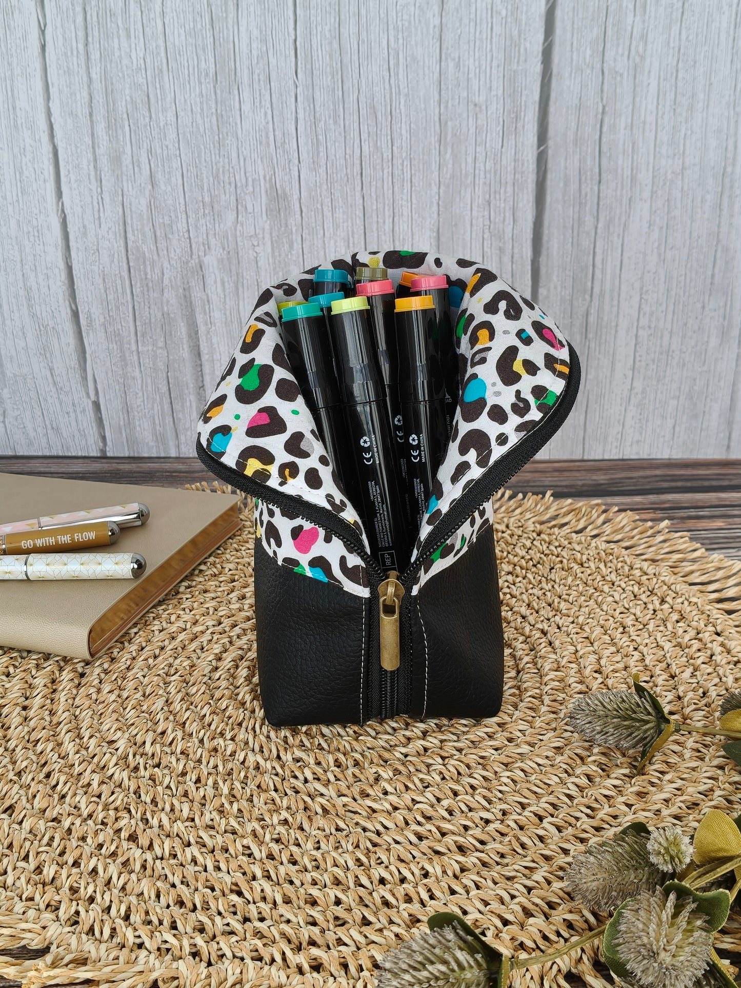 Estuche vertical animal print